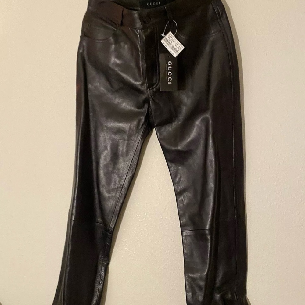 $1,300 new Gucci leather jean , black color, 100% authentic, size 31.